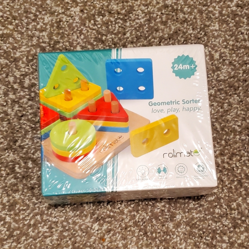COPY - 5/$30 BNIB sealed geometric wooden sorting toy